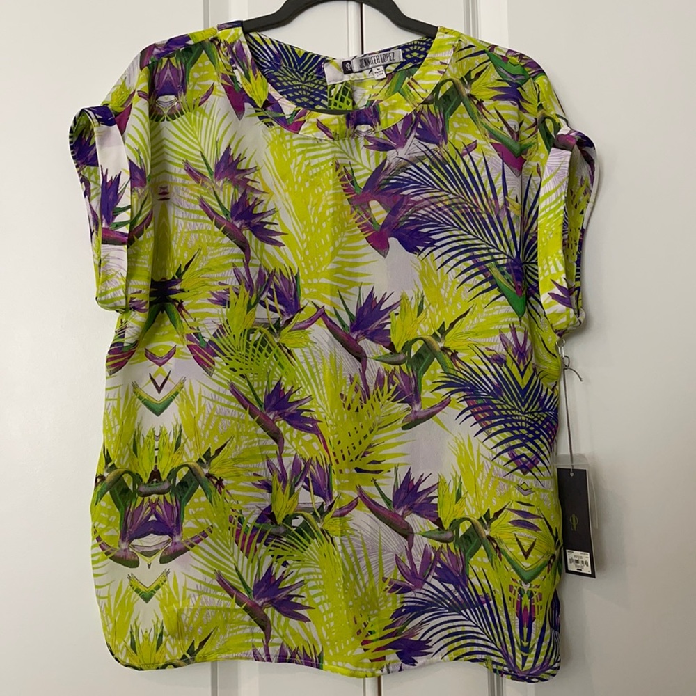 Jennifer Lopez green blouse